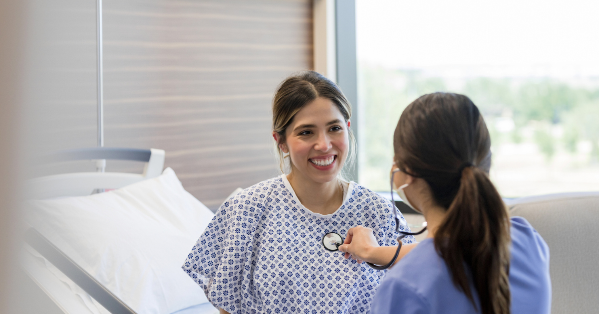 Woman at the doctor's office getting her heart checked