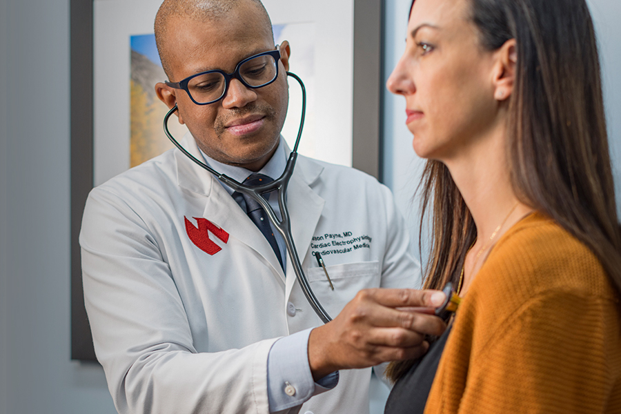 a Nebraska Medicine cardiology provider with a stethoscope.