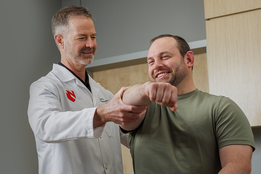 A Nebraska Medicine orthopaedics provider with a patient.