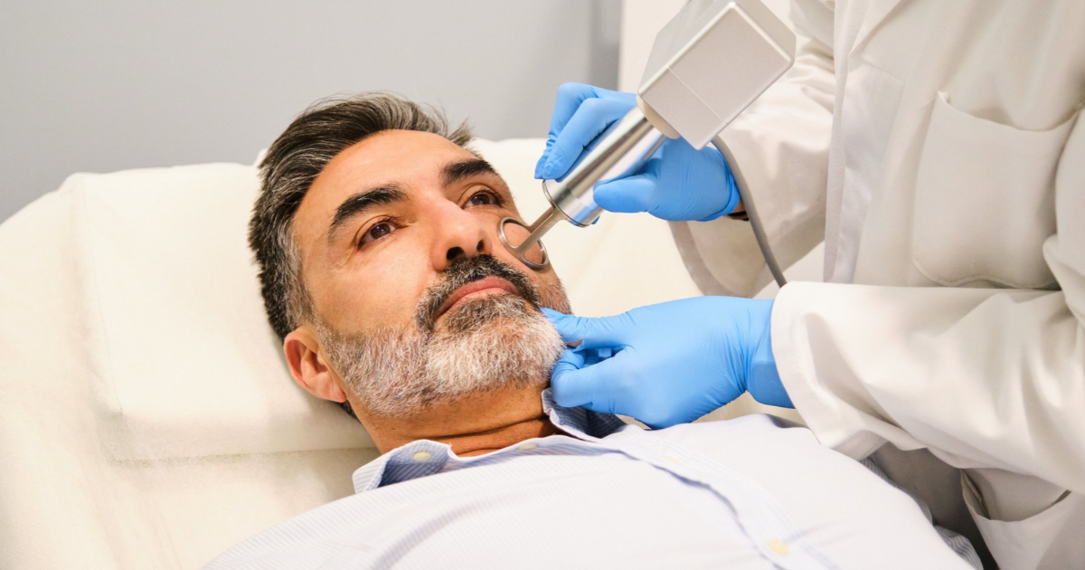 Man receiving laser resurfacing treatment
