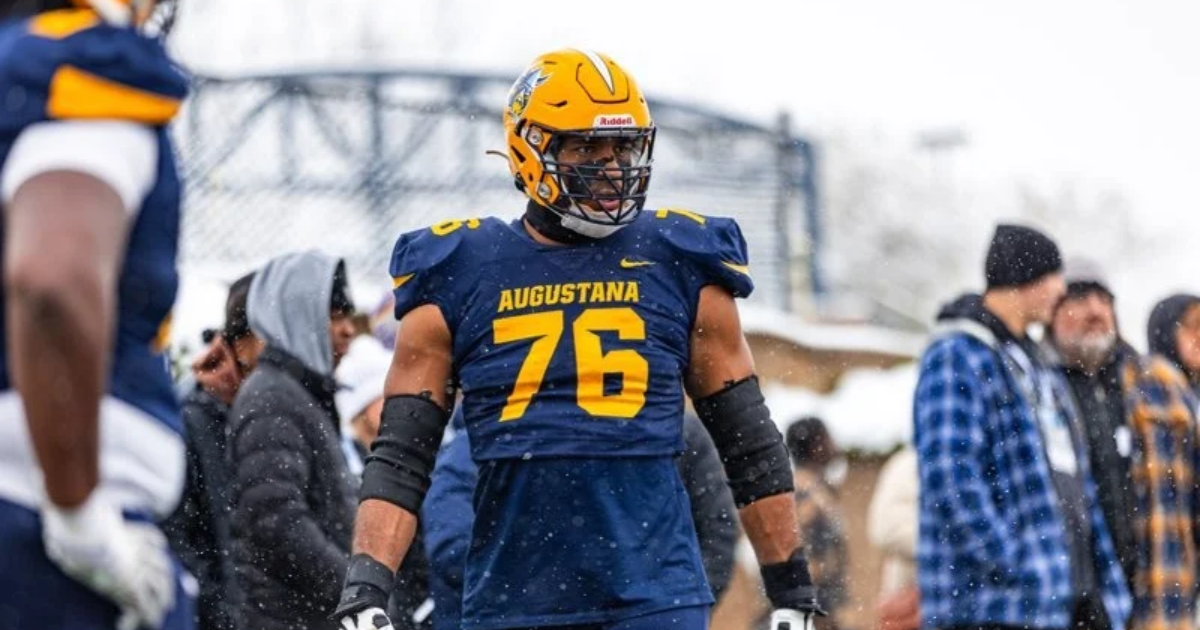 Shan Acharya playing football for Augustana University
