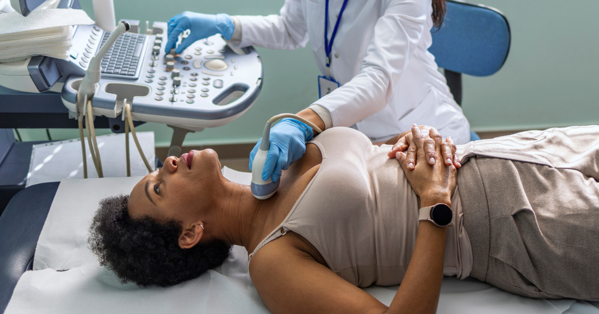 Woman getting ultrasound on her neck