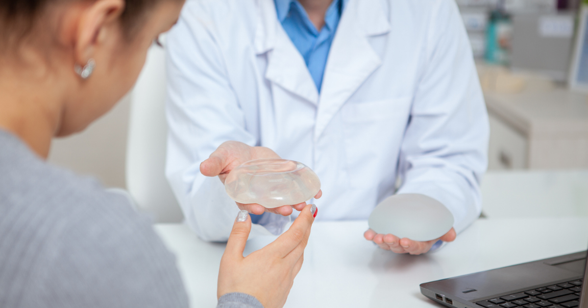 Woman in breast implant consultation