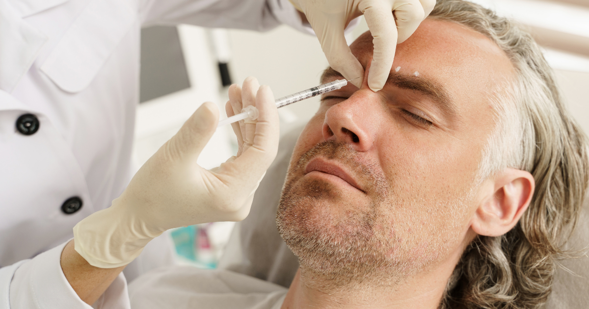A picture of a man receiving facial injections