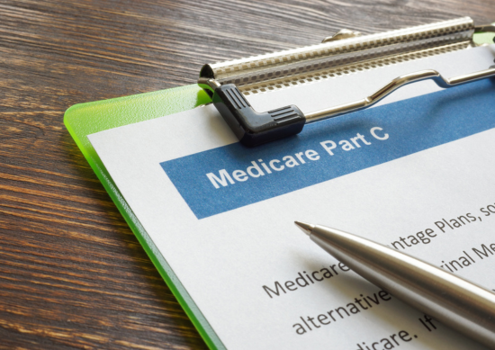 Paper on clipboard that says Medicare Part C