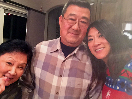 Ming Wang with his wife Lu Wang, left, and daughter Anne Peterson, right. 