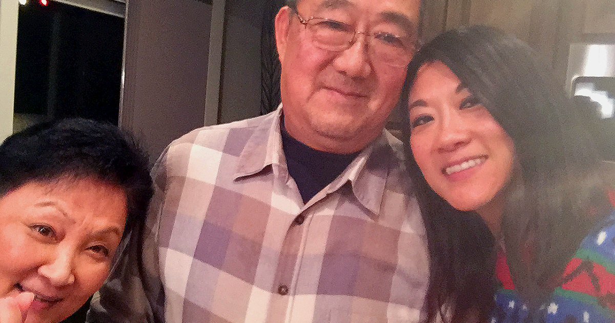 Ming Wang with his wife Lu Wang, left, and daughter Anne Peterson, right.
