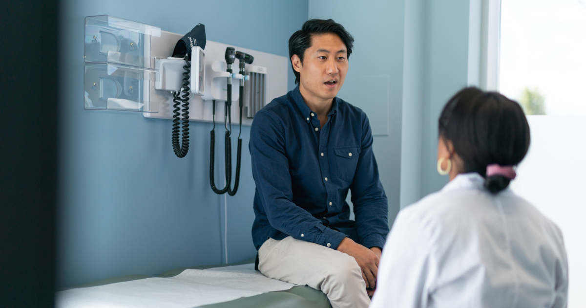 Picture of a man sitting in a doctor's office