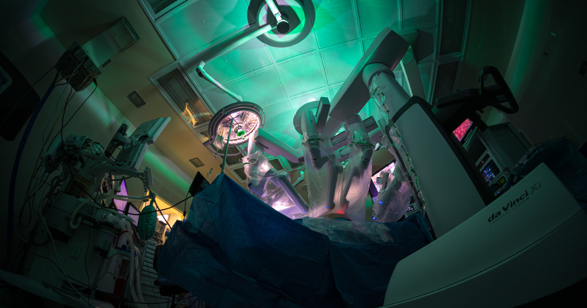 Wide shot of robotic surgery in progress