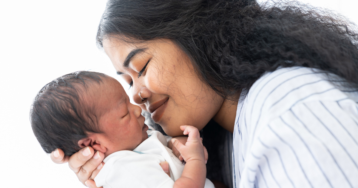 Woman holding a baby