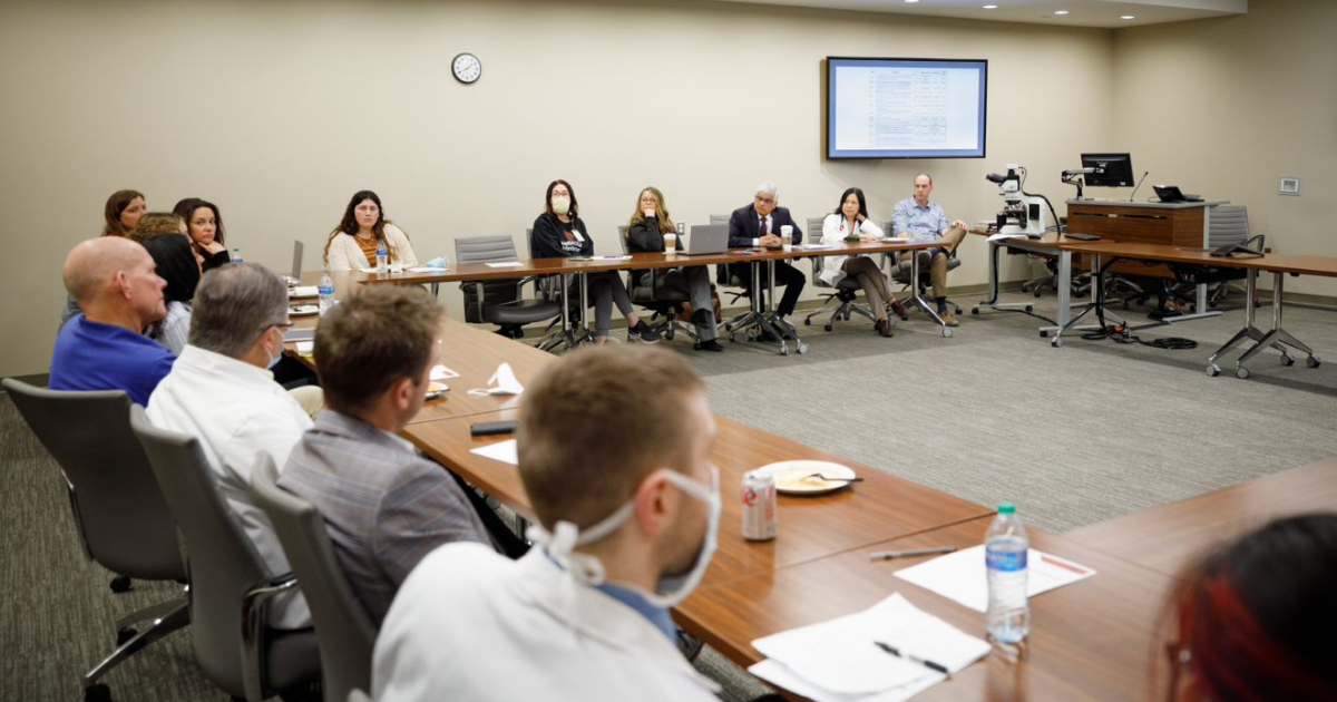 Nebraska Medicine colleagues meeting in a conference room