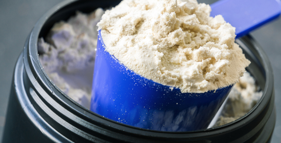 Big, heaping scoop of white protein powder