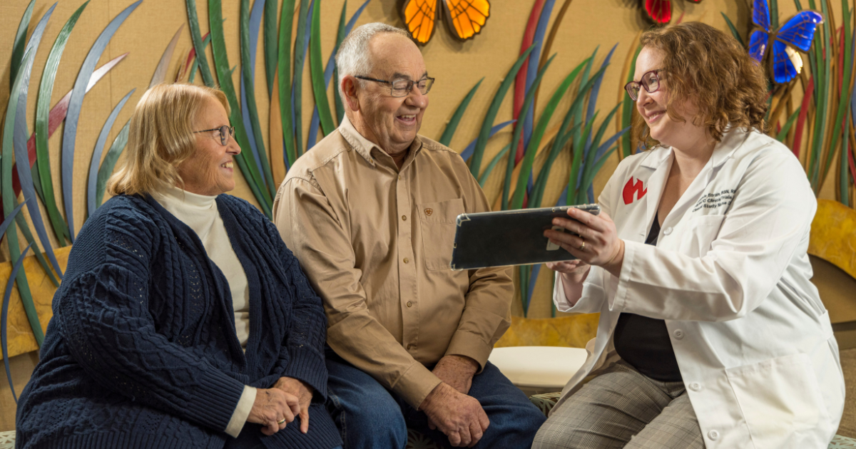 Martha Potts, clinical trial patient James Potts, and nurse coordinator Amanda Strain