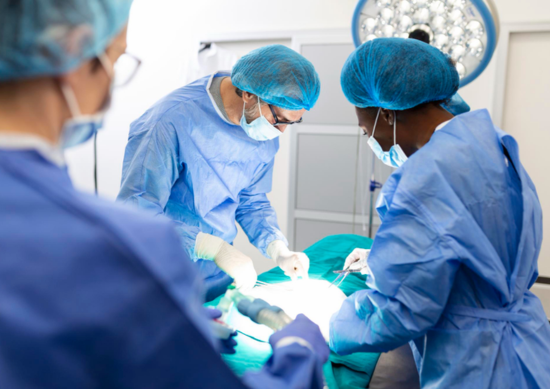 Doctors performing Mohs surgery