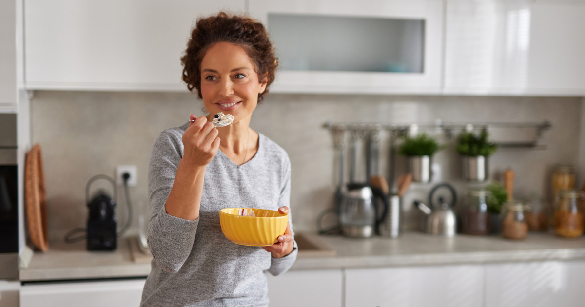 Woman eating oatmeal
