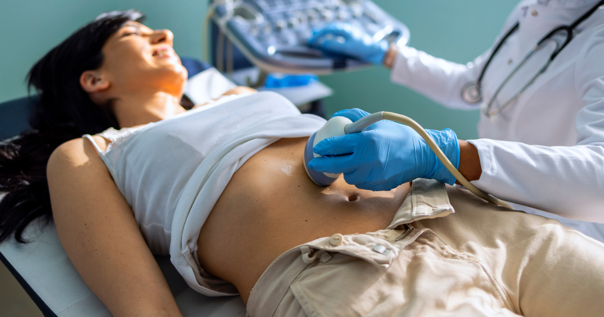 Woman receiving an ultrasound on her stomach