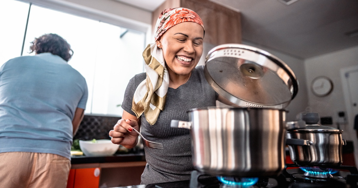 Woman with cancer cooking