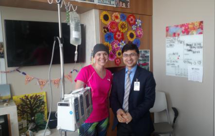 Mary Robinson stands with oncologist Vijaya Bhatt, MBBS, MS. "He took the time to listen, and right away I knew I had the best doctor," says Mary.