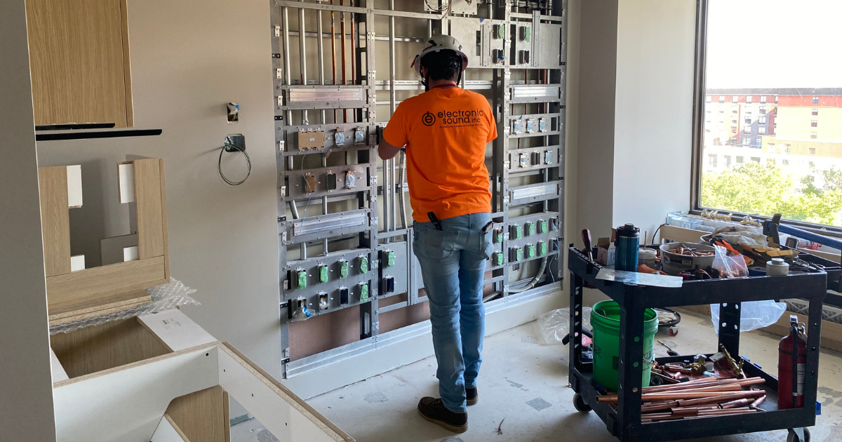 Construction worker in Clarkson Tower room
