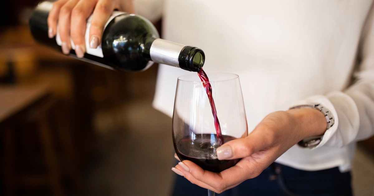 Close up of woman pouring wine