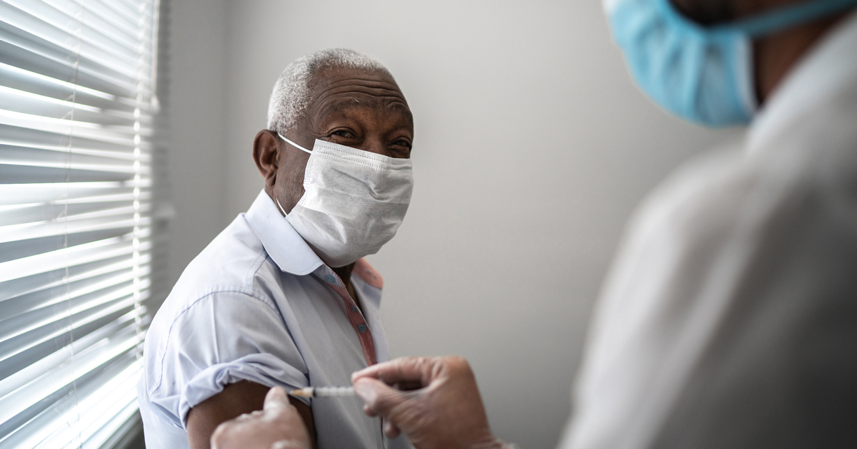 Man receiving vaccine