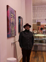 Dany Reyes in his art gallery, where he spent a week of quarantine.