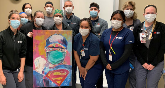 Photo of emergency department with the painting from Reyes.