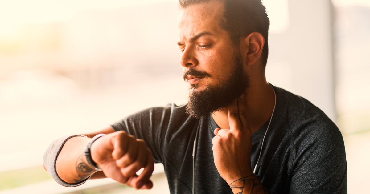 Man checking his pulse