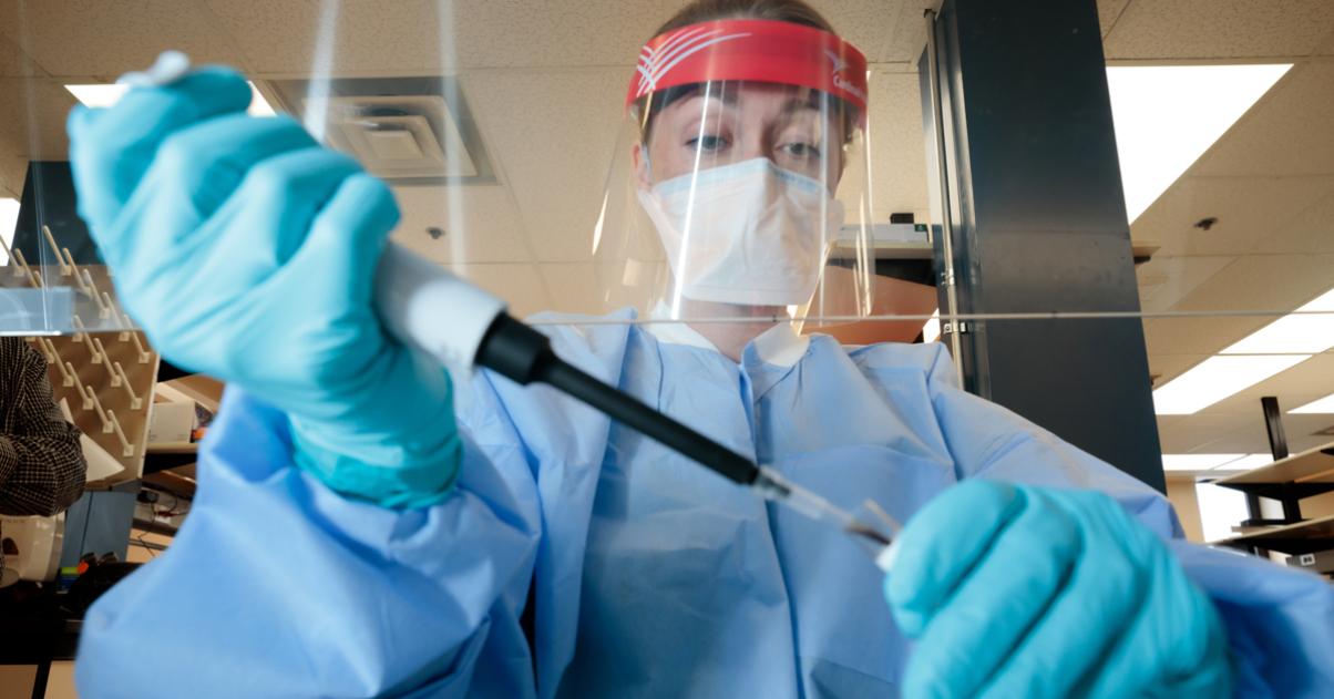 Medical staff performing lab test