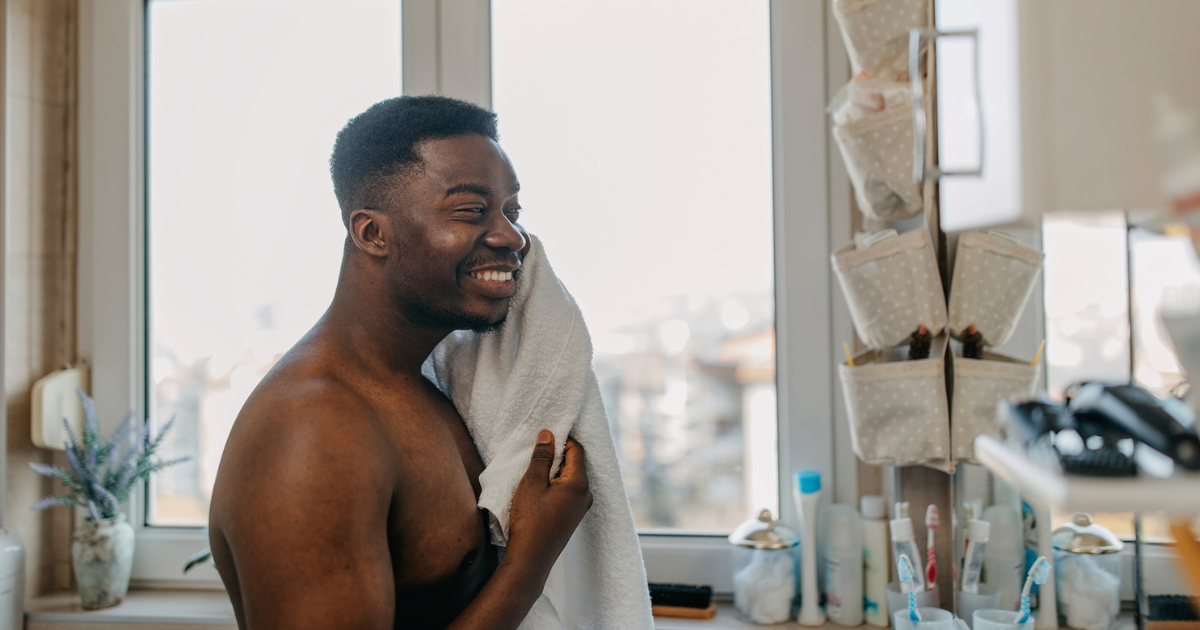 Man washing his face