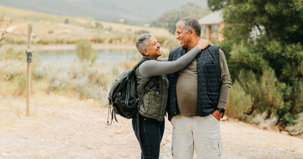 Man and woman hugging outside