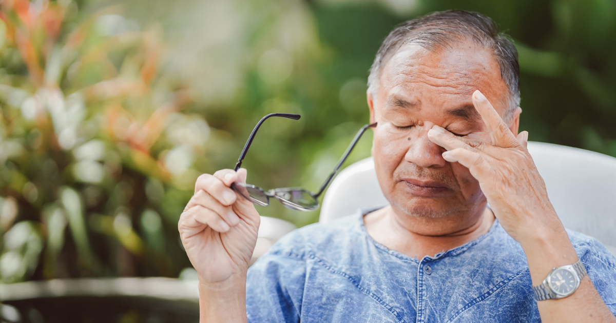 Man rubbing his eyes