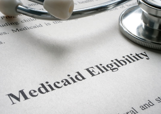Close up of stethoscope on paper that says "Medicaid Eligibility"