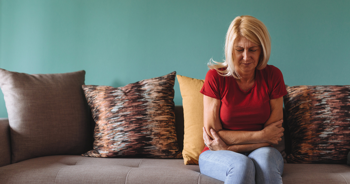 Woman holding her stomach