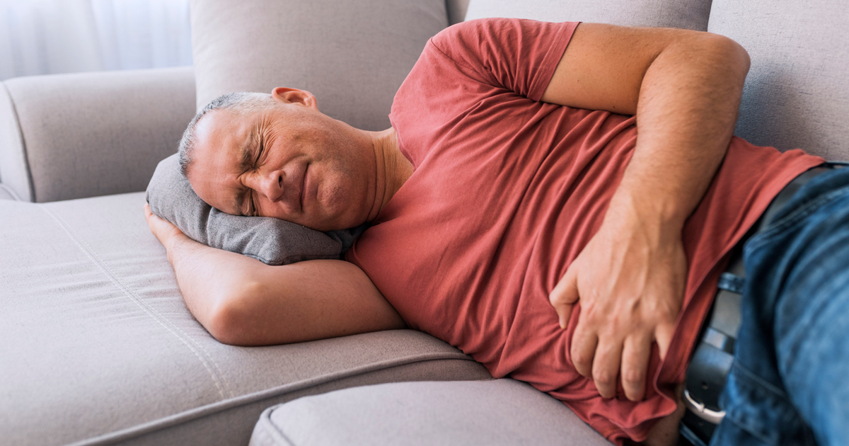 Man holding his stomach