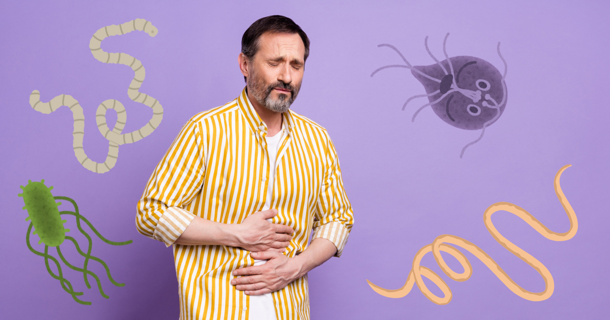 Man holding stomach in pain, surrounded by cartoon parasites