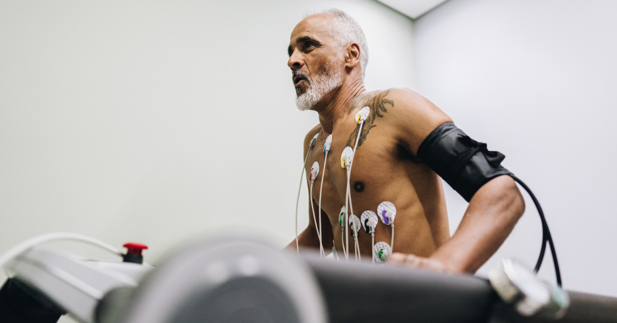 Senior patient taking cardiopulmonary stress test on a doctor's office