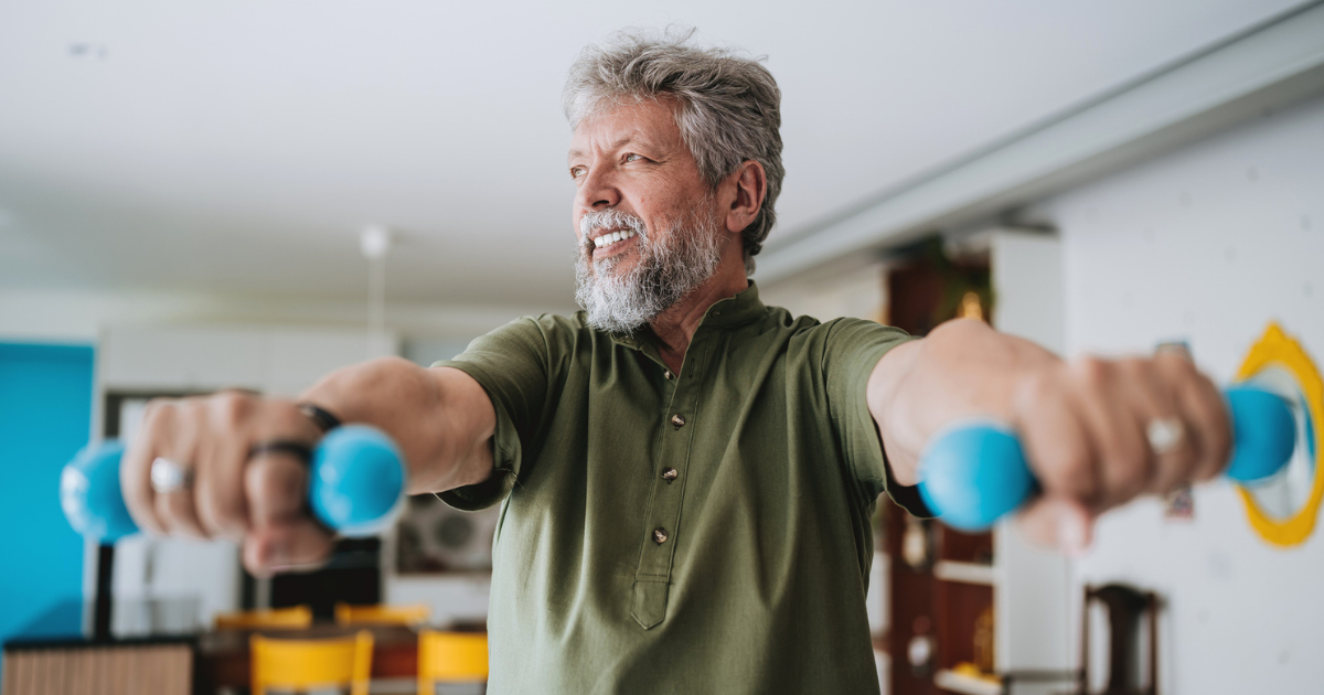 Man holding small dumbbells