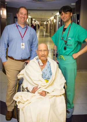 From left to right: Dr. Brett Duncan, Nebraska Medicine cardiothoracic surgeon; patient Larry Engel; Dr. Shahbaz Malik, director of the Nebraska Medicine cardiac catheterization laboratory