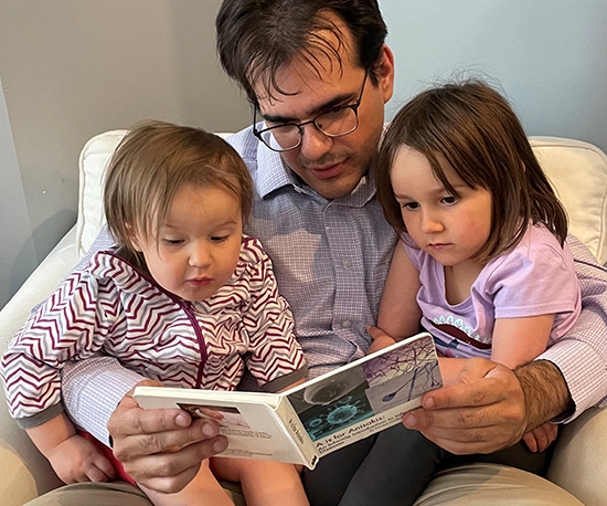 Infectious diseases expert Nicolás Cortés-Penfield, MD with his daughters Elise and Celeste