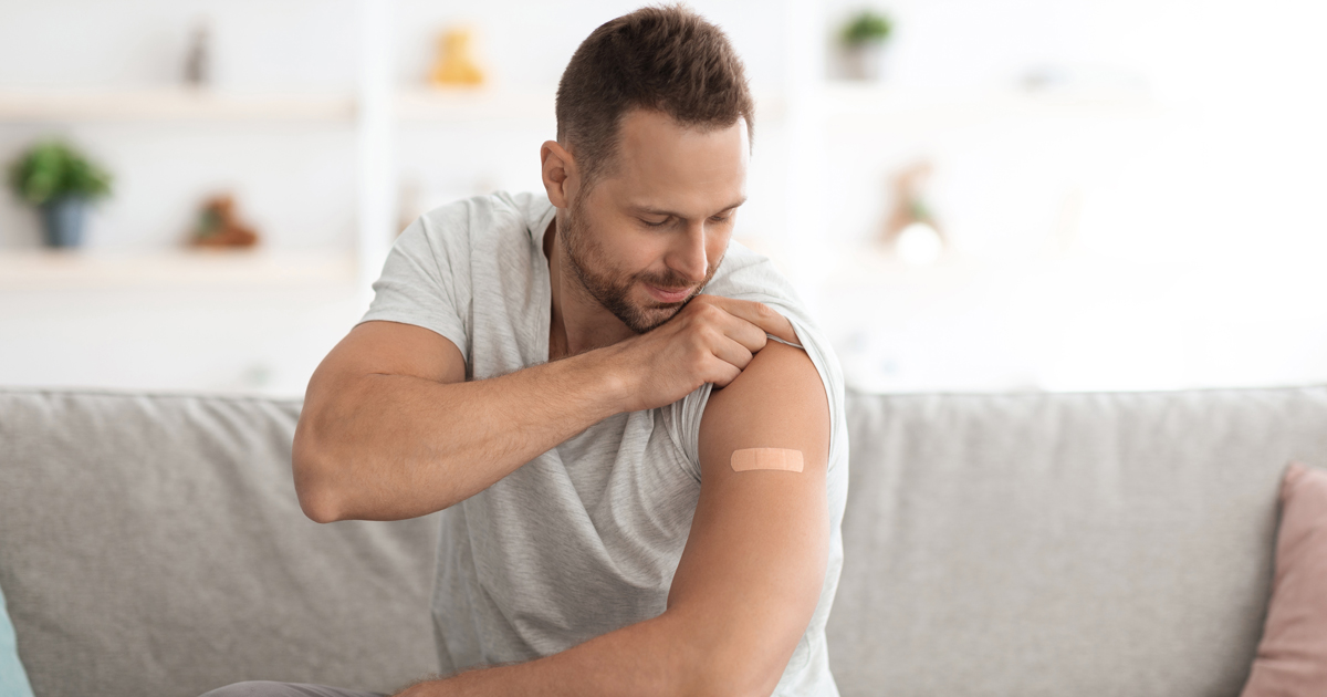 Man looking at his shoulder