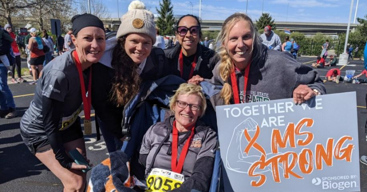 Kim Kozelichki lives with MS and completed the Lincoln Half Marathon in 2022 with support from her care team. Individuals featured left to right: Renee Stewart, APRN, DNP, MAHA Program; Eileen Meslar, friend and supporter of the team; Kristen Bayly, RN, MS At Home Access Program; and Nancy Lenz, PT, with Key Complete Therapies.