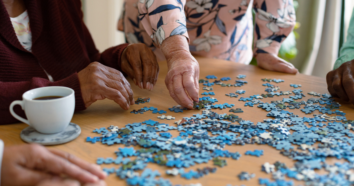 People working on a puzzle