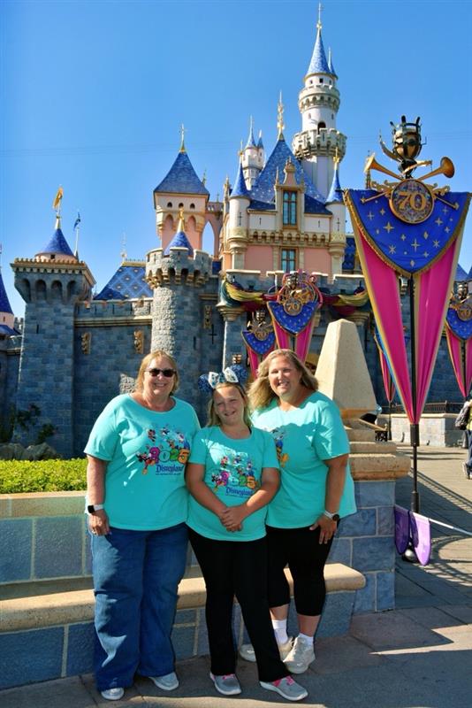 Kris Emken, daughter and granddaughter at Disneyland
