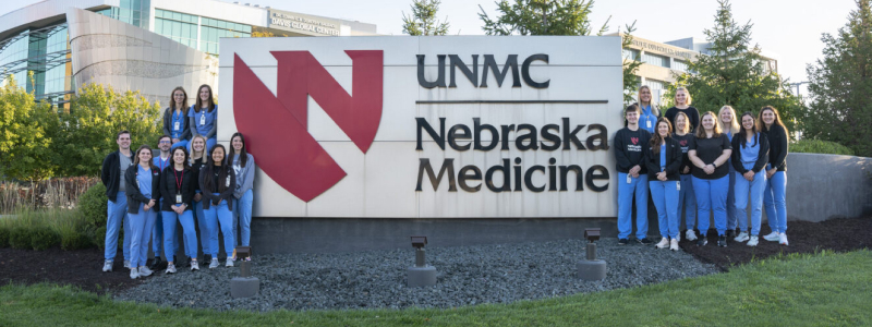 Pharmacy Residents by Nebraska Medicine sign - 2023