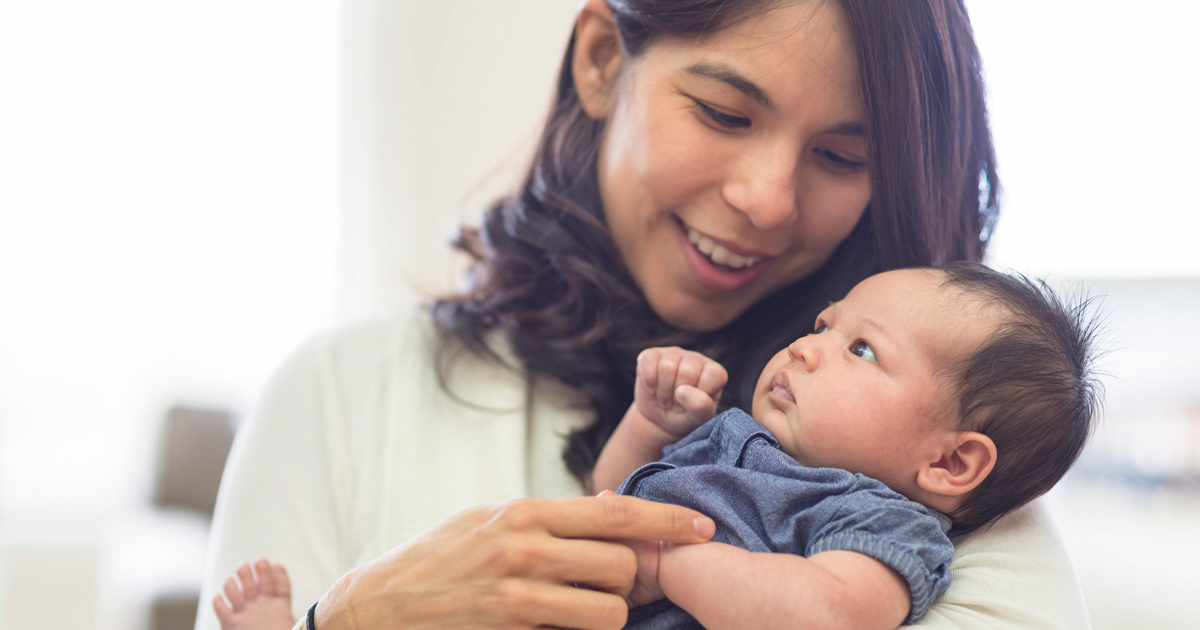 Woman holding her baby