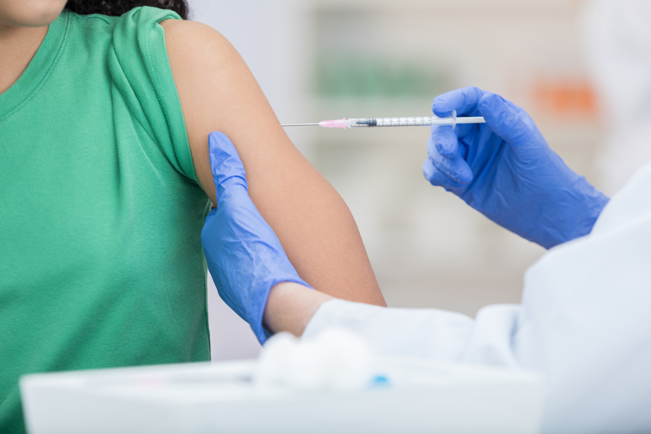 Woman getting vaccine