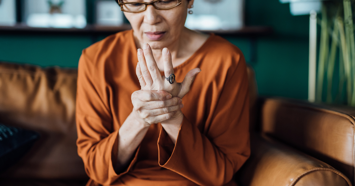 woman holding wrist