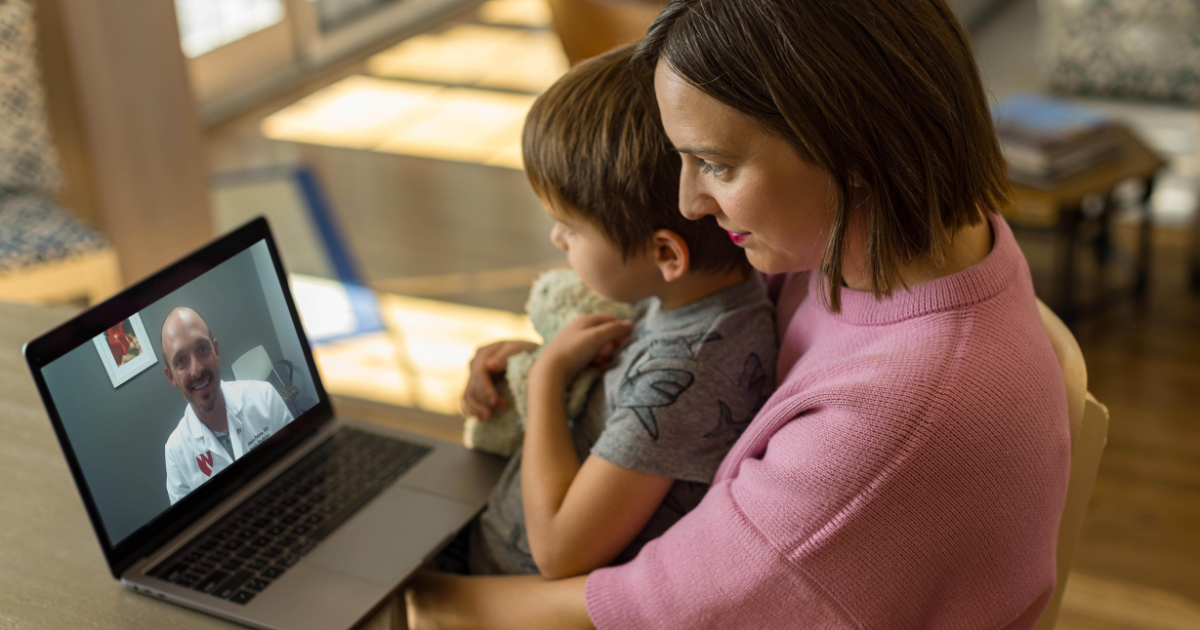 Mother and son on virtual visit with Nebraska Medicine doctor