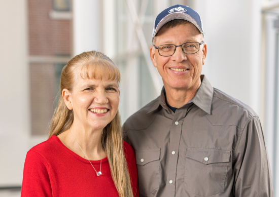 Patient Lynn Schnoor standing with her husband Eric